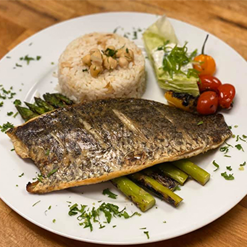 Grilled Seabass served with asparagus and rice_